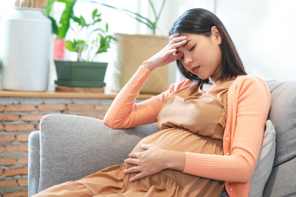 Cách giảm đau đầu khi mang thai bằng cách duy trì tư thế đúng là gì?
